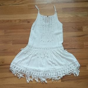 White mini dress with lace and fringe